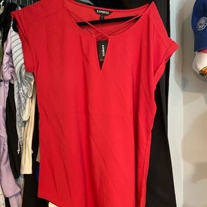 Really cute work shirt or good to wear out to a dinner night. Never worn.